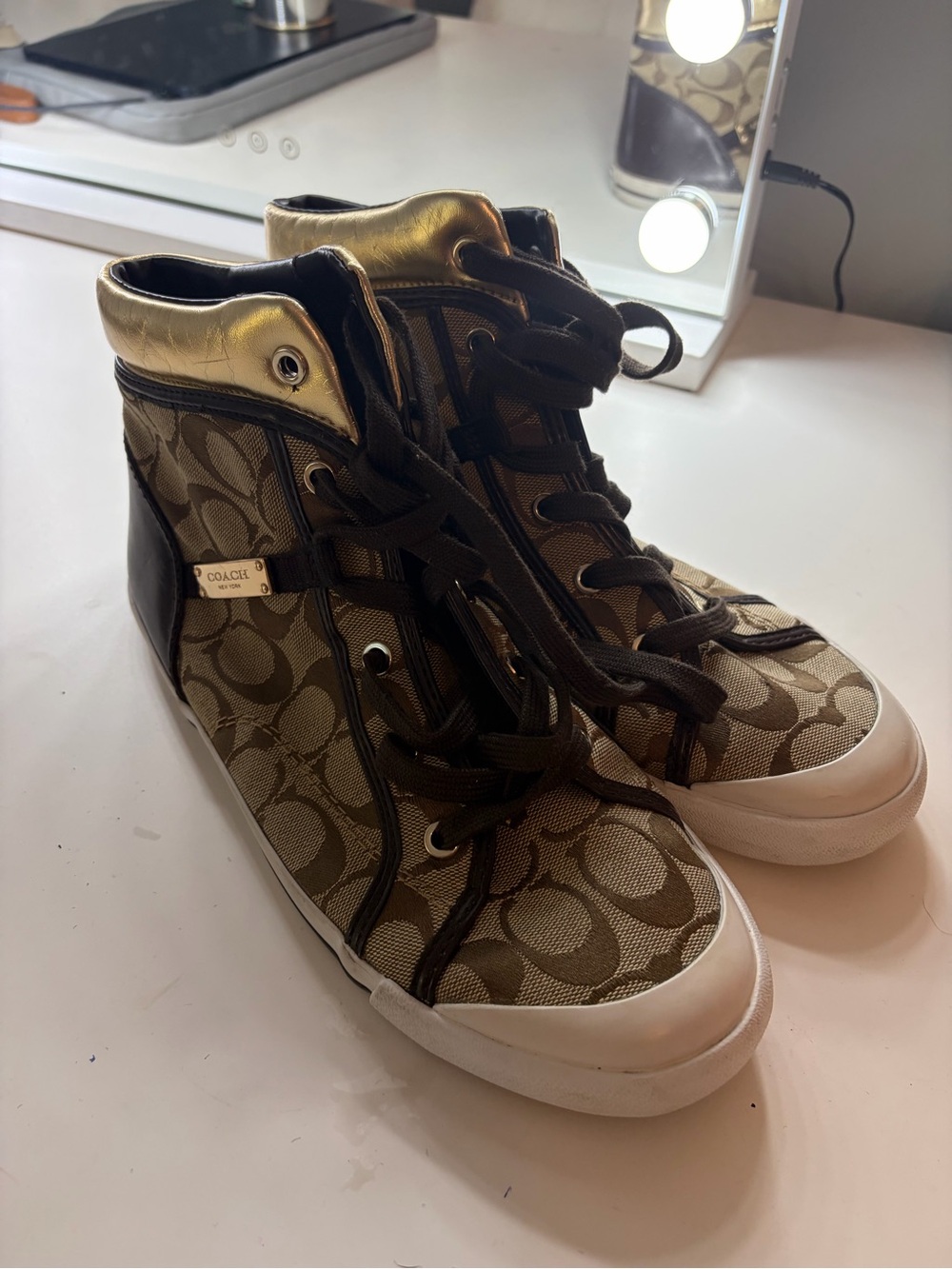 Coach Brown Signature High-Top Sneakers with Black Trim and Gold Accent